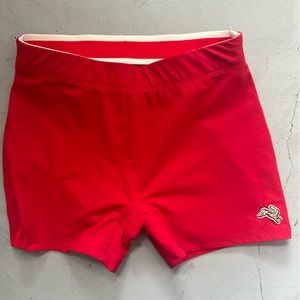 Red Tracksmith shorts
